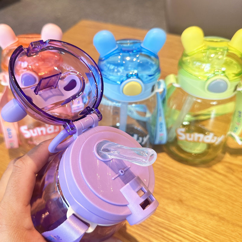 Xinbeidi 2010 Children's Plastic Water Cup, Straw, Strap, Plastic Cup, Fun Rabbit Ears, Plastic Cup, Student Water cup Application Scenario