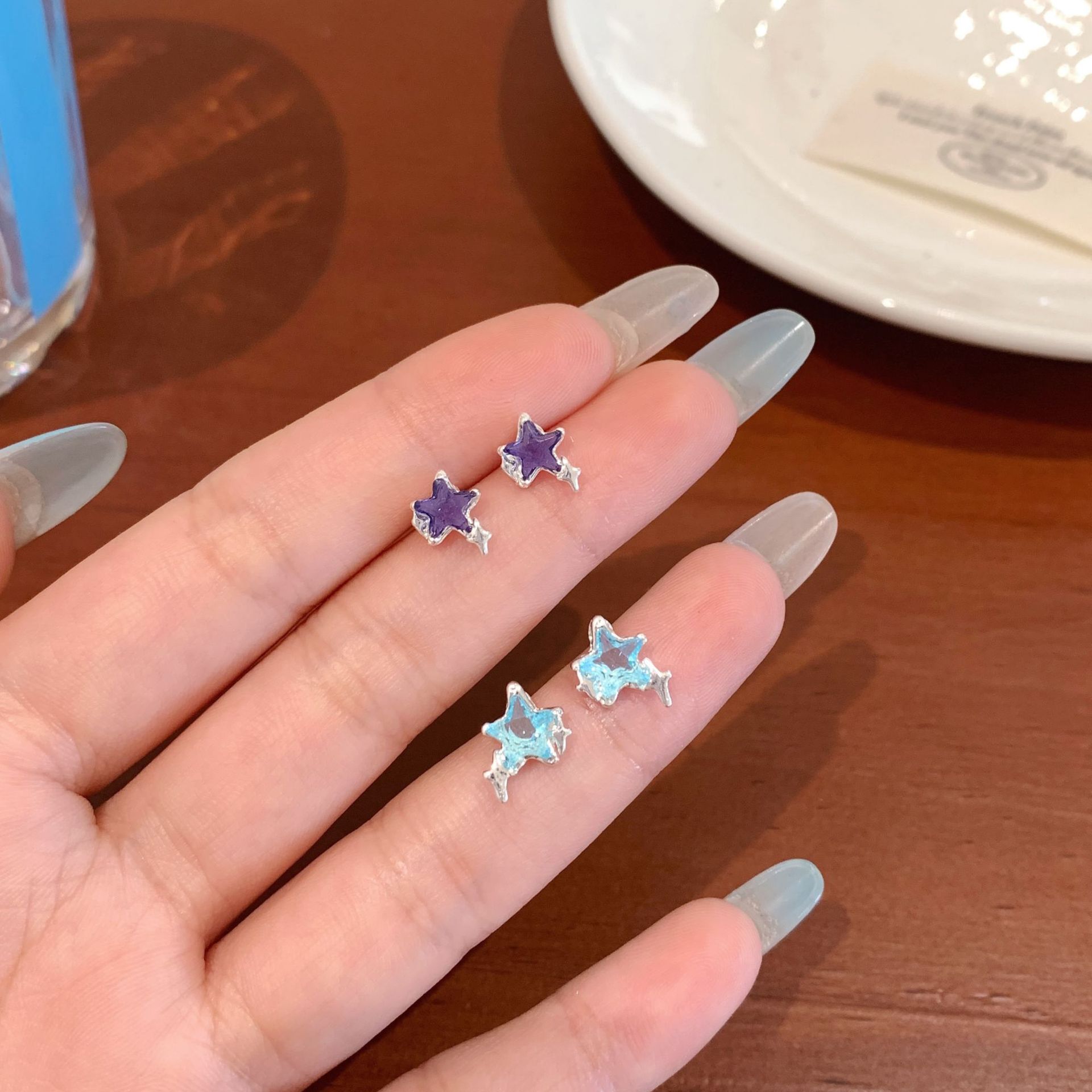 Blue zircon five-pointed star moon stud earrings, silver needle for women, small design sense, simple and elegant ear-piercing, student earrings Application Scenario