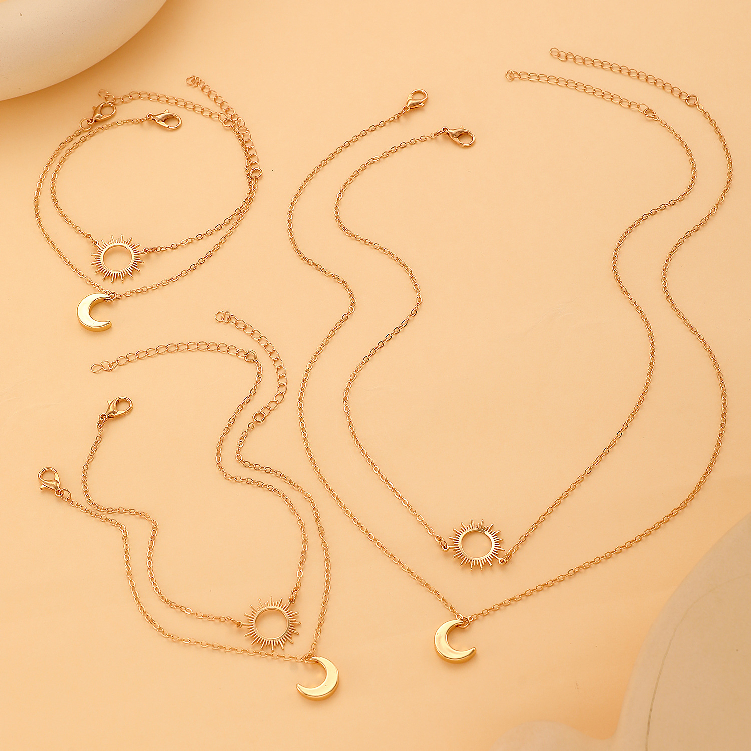 European and American cross-border hollowed-out sun and moon couple ankle chain necklace bracelet double-layer layered jewelry set for women Application Scenario