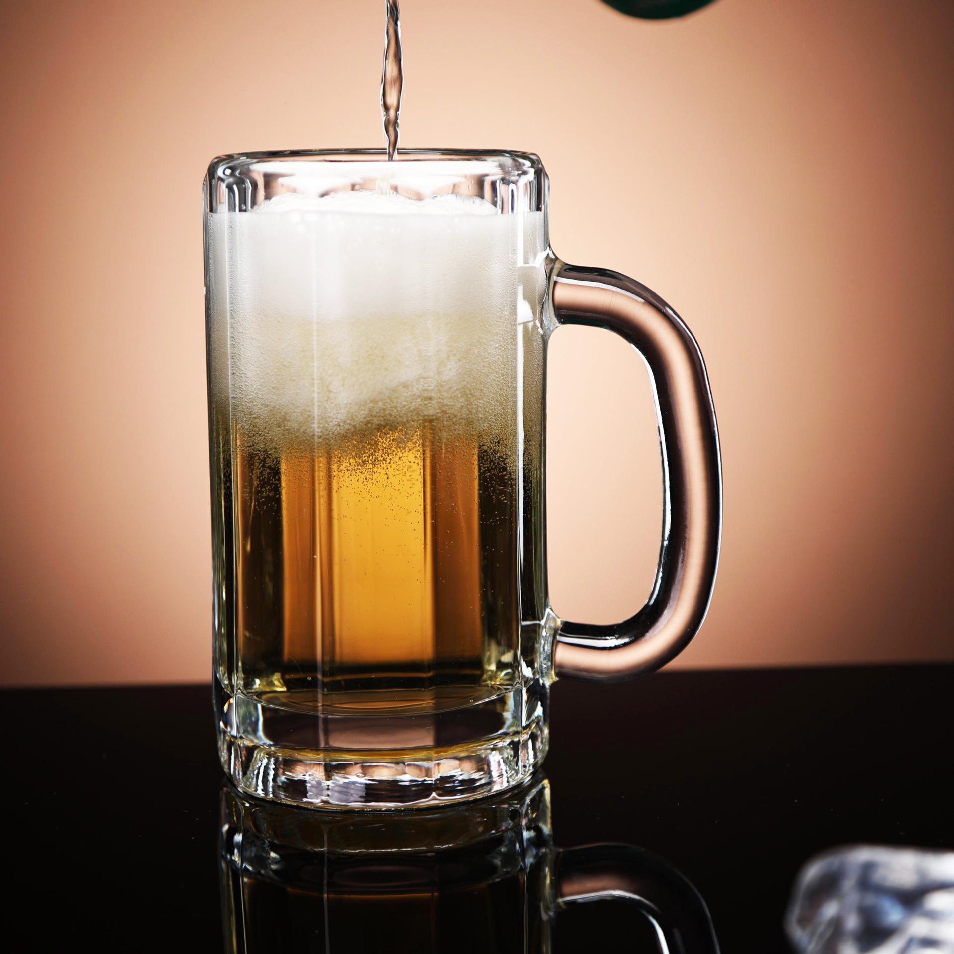 Large-capacity beer mugs, transparent glass draft beer craft cups, thickened tea cups, household Leyin handle cups are available for wholesale details Picture