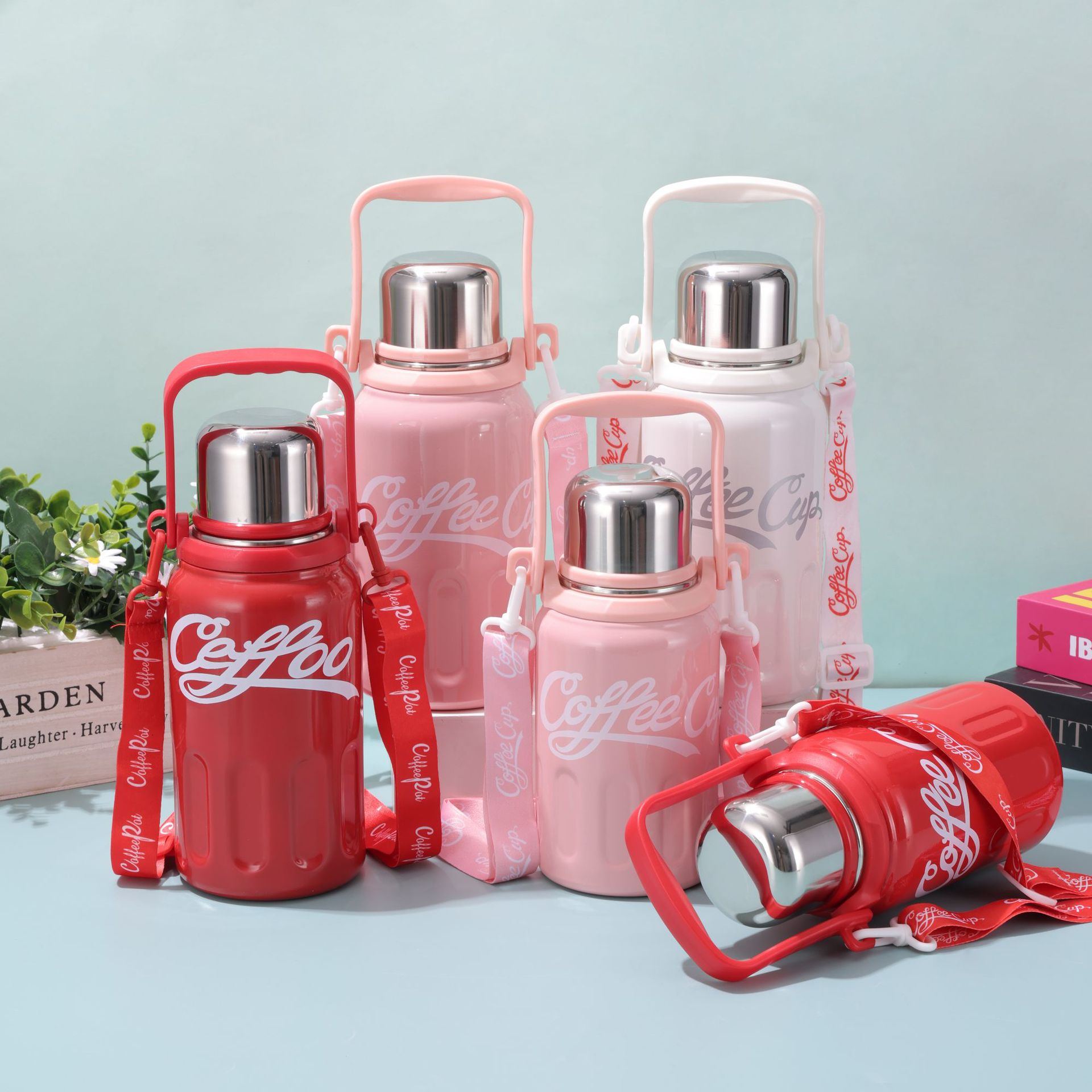 The new cross-border 316 stainless steel insulated cup can be carried outdoors with a handle rope. It is a large-capacity water cup for cola water bottles details Picture