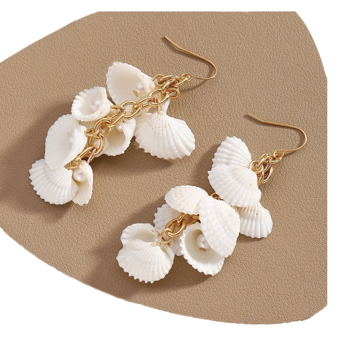 Cross-border best-selling Korean-style long shell tassel earrings, fashionable white shell flower high-end women's stud earrings Item Picture