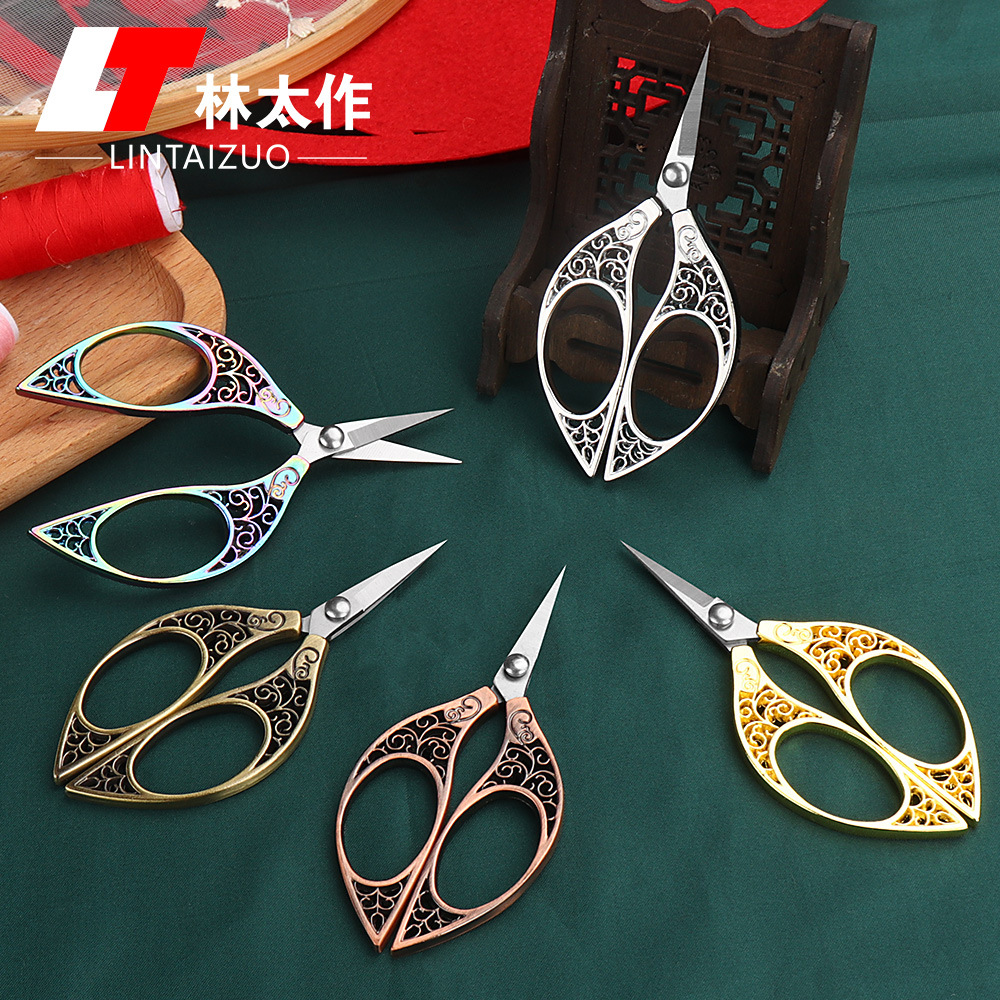 Wholesale of vintage small scissors, tailors, thread ends, tea tips, stainless steel office dragon and phoenix handcrafted special gold scissors full figure