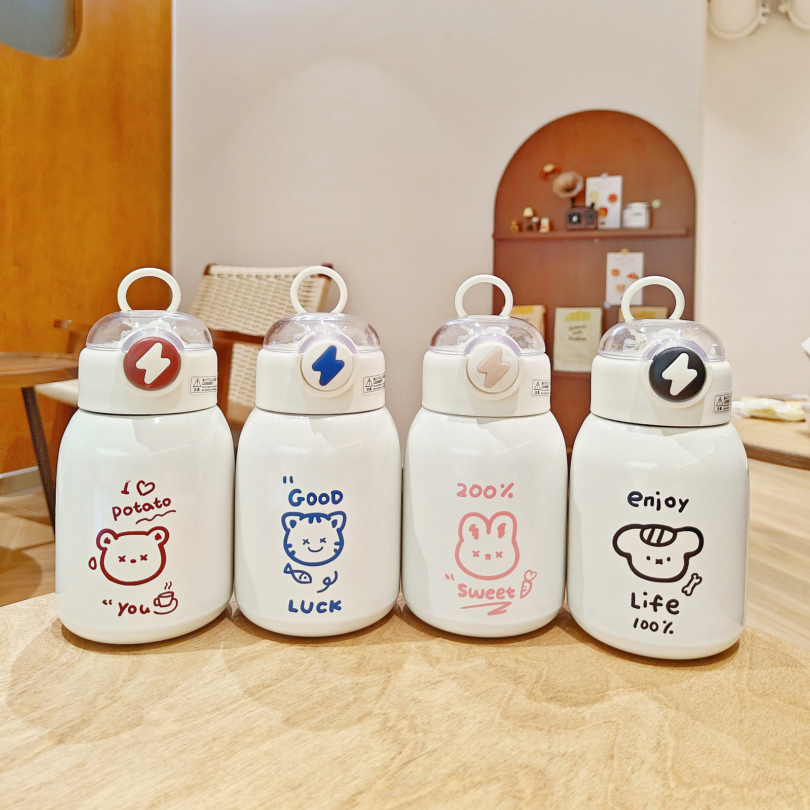 Wholesale of cute thermos cups, simple cartoon student portable straw cups, hand-held stainless steel water cups for girls with big bellies details Picture