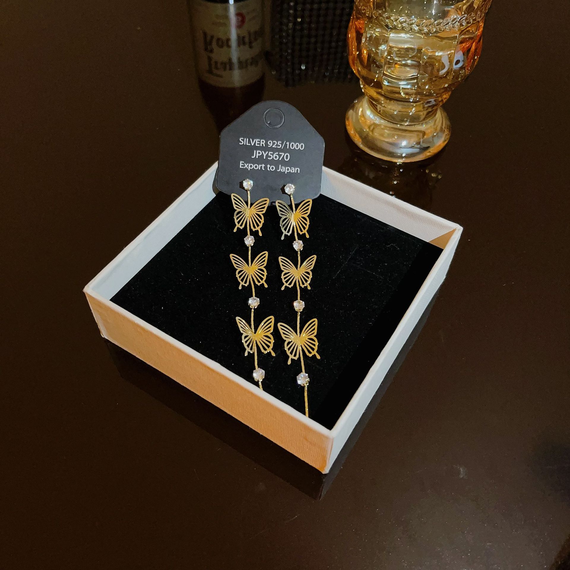 Korean style long earrings design sense, niche Internet celebrity fashion, versatile and slimming earrings, butterfly tassel earrings for women full figure