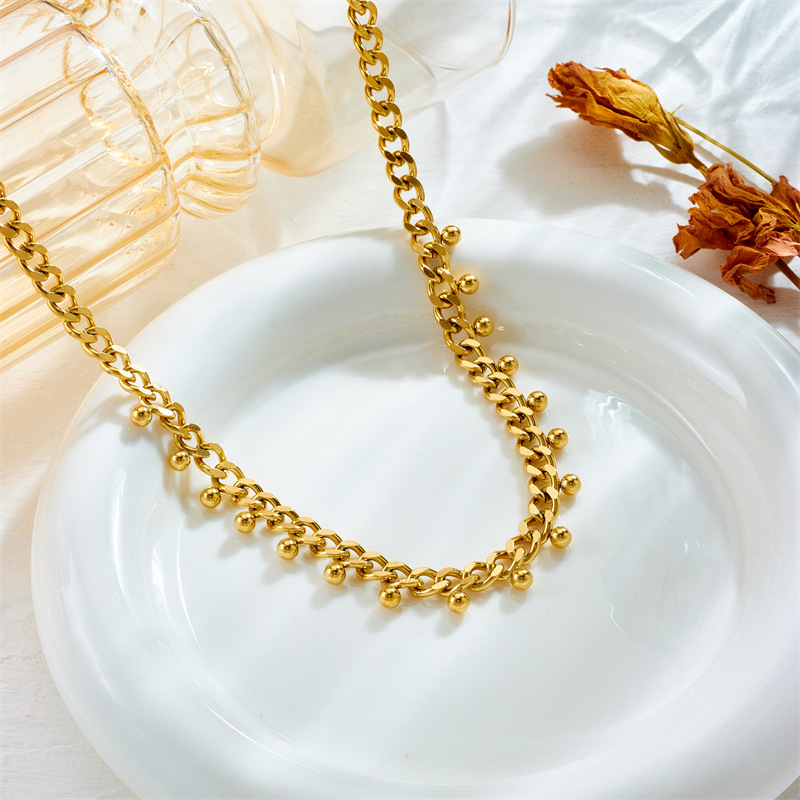 Fashionable, niche and simple design metal titanium steel thick chain gold bead pendant jewelry collarbone chain necklace details Picture