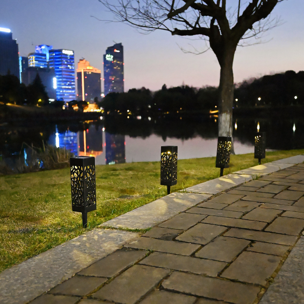 Outdoor waterproof solar lamp, beautiful hollowed-out ultra-low lamp, creative warm light LED light-controlled sensor lawn and courtyard lamp Application Scenario