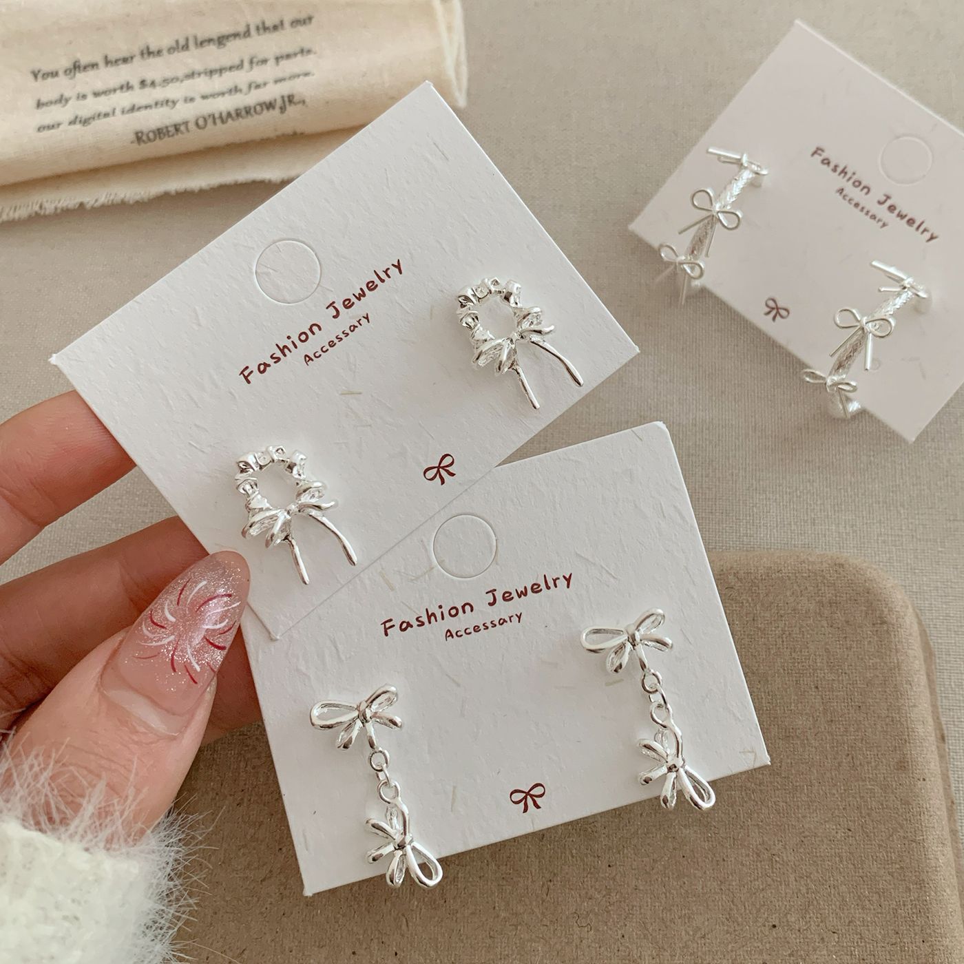 New minimalist silver exquisite bow pendant stud earrings, women's silver needle, niche design, high-end feel, daily earrings Application Scenario