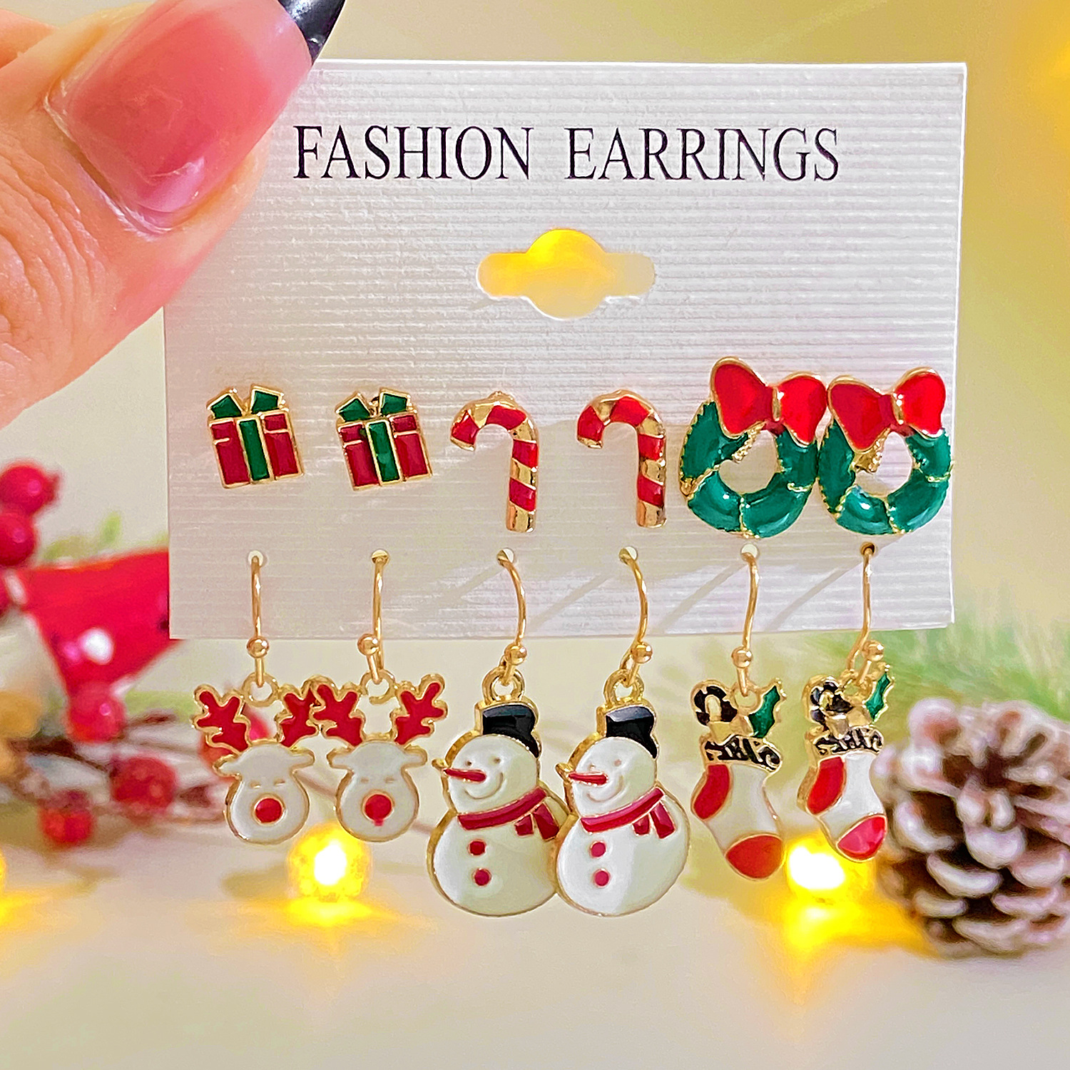 European and American Christmas earring set combination ins alloy oil-dripping snowman Snowflake reindeer Christmas tree stud earrings Specification drawing