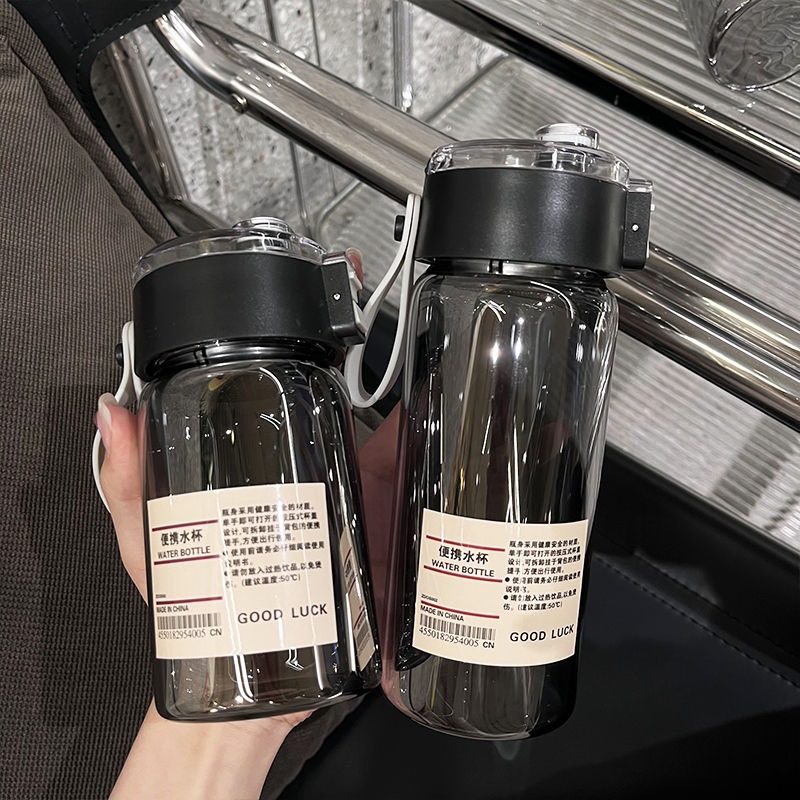 The new Muji alternative cup is a smoke gray portable large-capacity, popular hand-held water cup with a small fragrance style and sticker details Picture