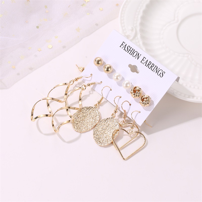 A popular European and American earpiece fashion leaf cross heart set of earrings, 6 pairs of earrings, with windmill pearl stud clips Specification drawing