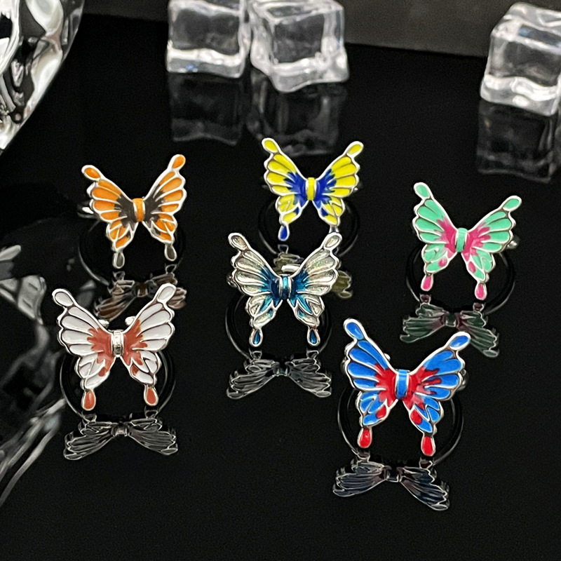 A liquid butterfly opening ring with a national trend style for women, featuring gradient colors, irregular fashion, individuality, and a sweet, cool and trendy ring accessory full figure