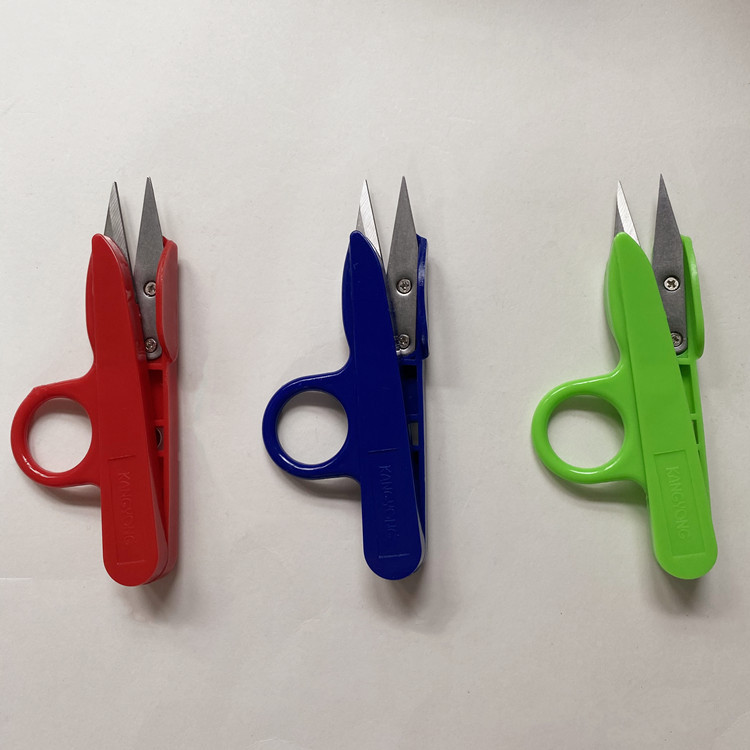 Colored plastic spring shears with loops, U-shaped shears, plastic handle shears, small scissors with thread ends, plastic handle shears full figure