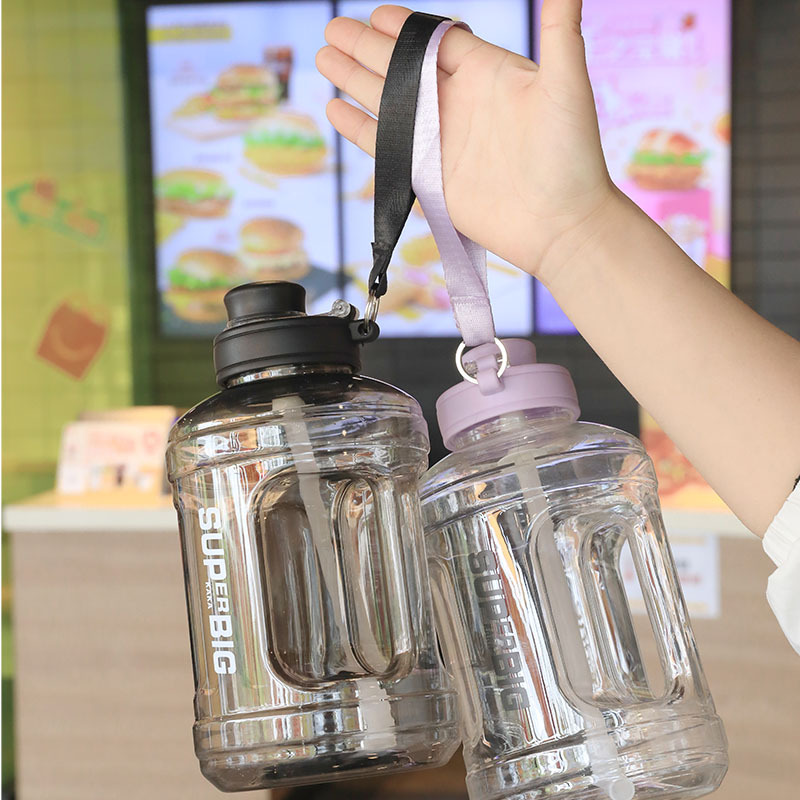 Wholesale of high-appearation-level large-capacity ton-ton water bottles, outdoor portable sports water bottles, fitness plastic water cups, and large-belted cups details Picture