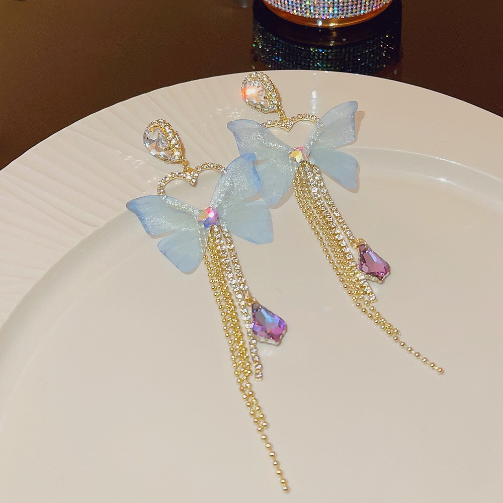 The elegant and luxurious, high-end butterfly tassel earrings exude an ethereal and exaggerated personality, with a nightclub socialite style and exquisite long earrings Specification drawing