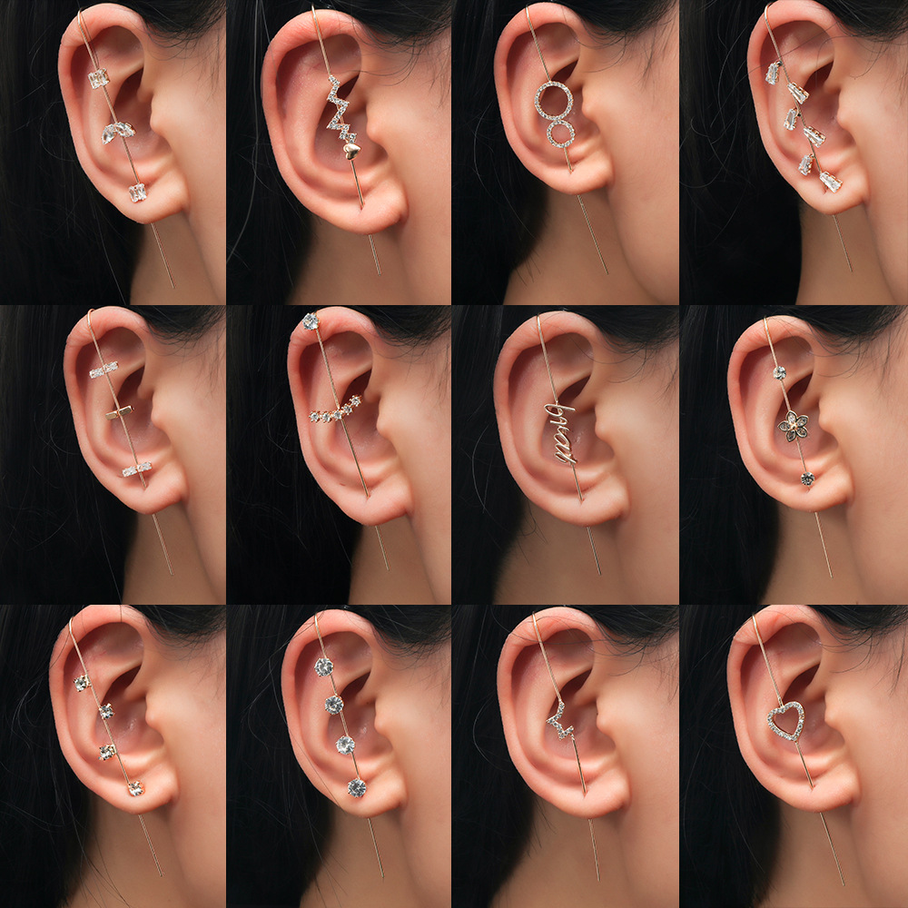 The new inS-style piercing ear piercing earrings are elegant and studded with zircon. The star letters surround the earlobes with diagonal stud earrings full figure
