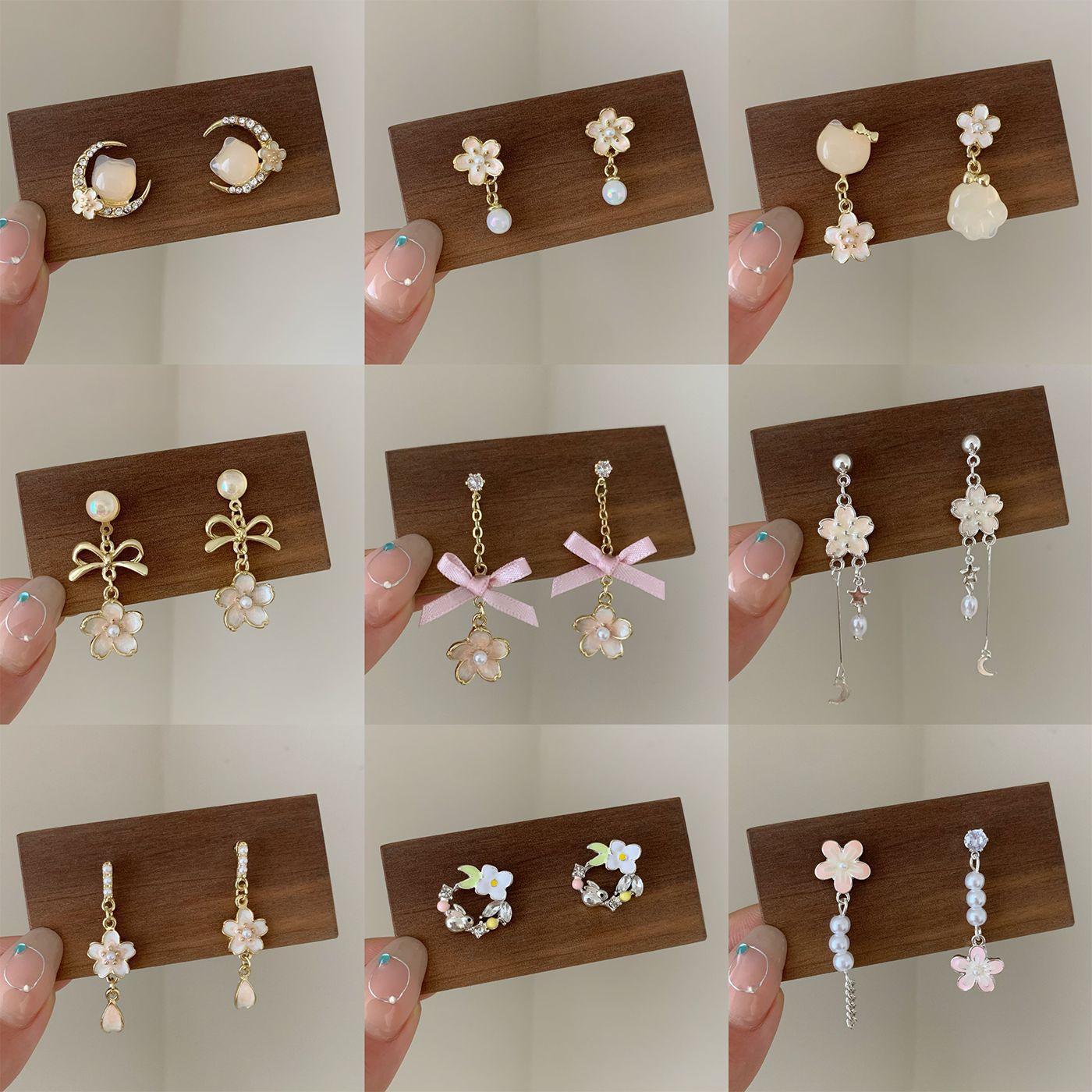 Spring is in full swing. Pink cherry blossom series earrings for women, silver needle, sweet floral charm, niche and high-end style. Wholesale of earrings full figure