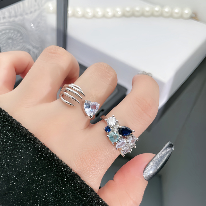 A unique Hong Kong-style, niche, sweet and cool, micro-set, exquisite open ring, a female skull hip-hop fashion, and a ring trend full of diamonds on the claws details Picture