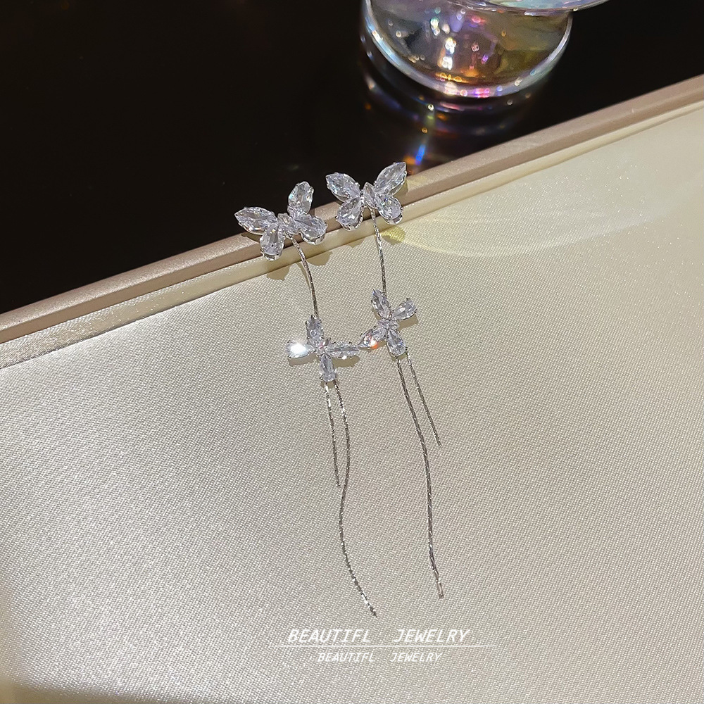 Super Sparkling long Zircon butterfly tassel earrings with a light luxury and high-end feel, niche stud earrings, women's fashionable and elegant earrings wholesale Application Scenario