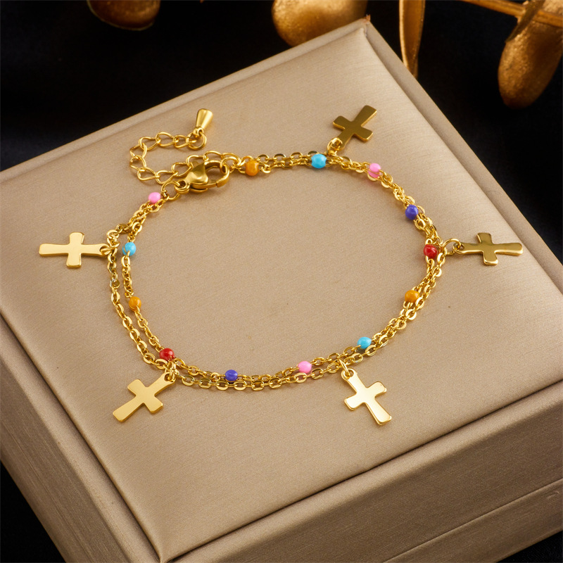 European and American fashion, creativity, individuality, versatility, ethnic style mixed color rice bead chain cross titanium steel pendant jewelry set Application Scenario