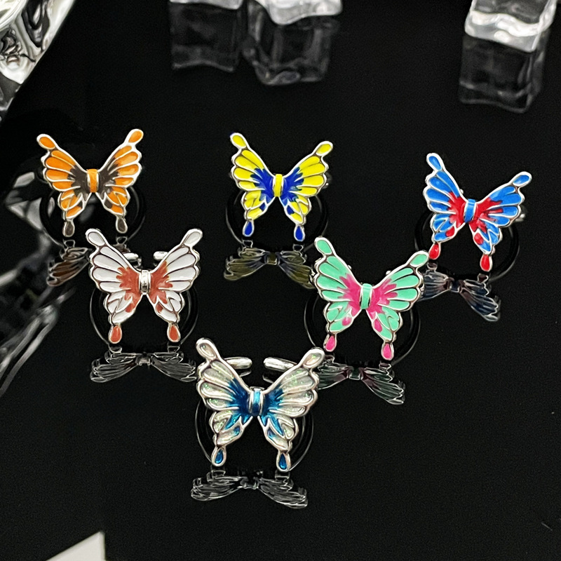 A liquid butterfly opening ring with a national trend style for women, featuring gradient colors, irregular fashion, individuality, and a sweet, cool and trendy ring accessory details Picture