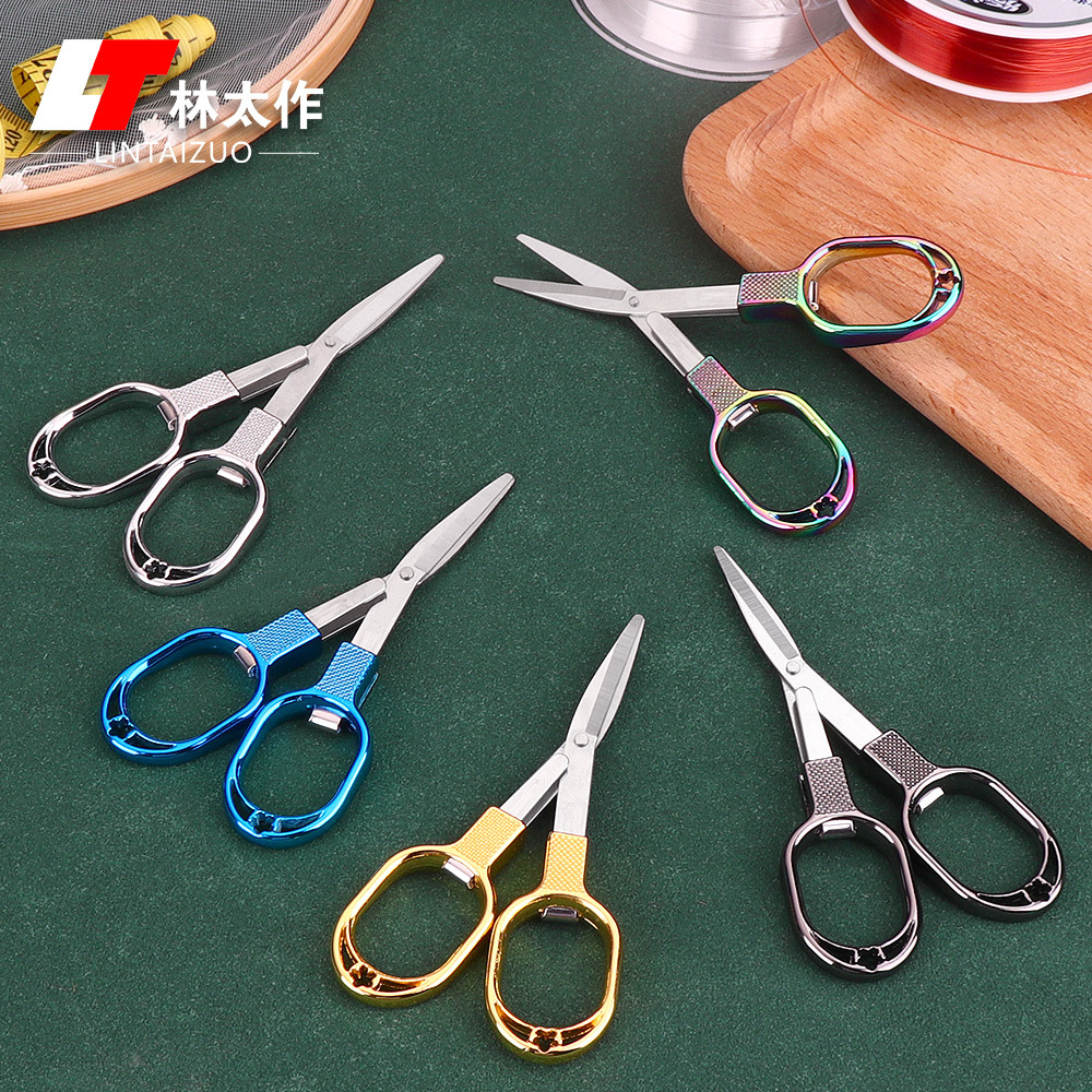 Folding fishing scissors, multi-functional lead shears, fishing line scissors, strong horse 8-shaped small scissors, fishing supplies and fishing gear Application Scenario