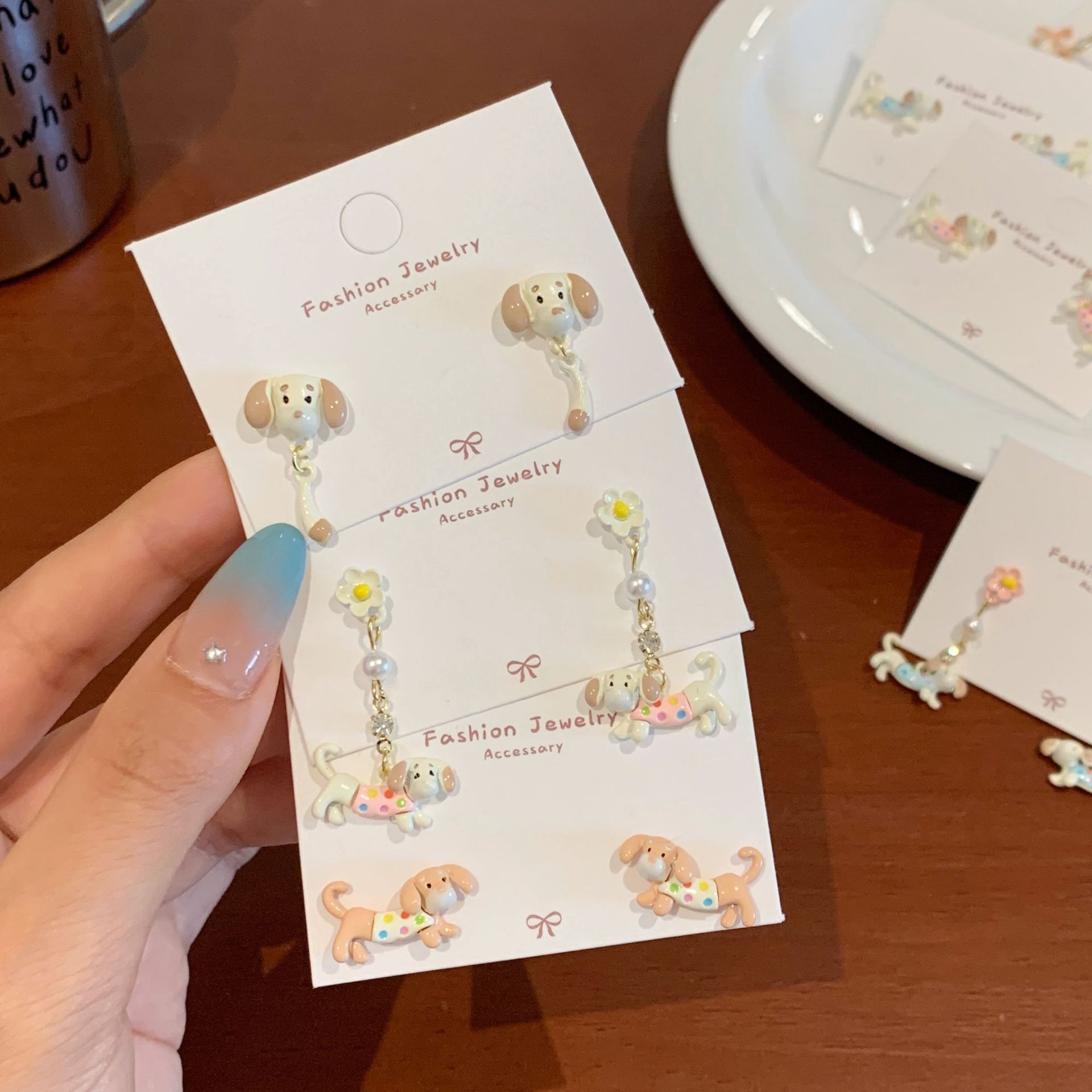 Cute and childlike polka dot Dachshund earrings, unique and niche silver needle design for women, cartoon color student earrings full figure