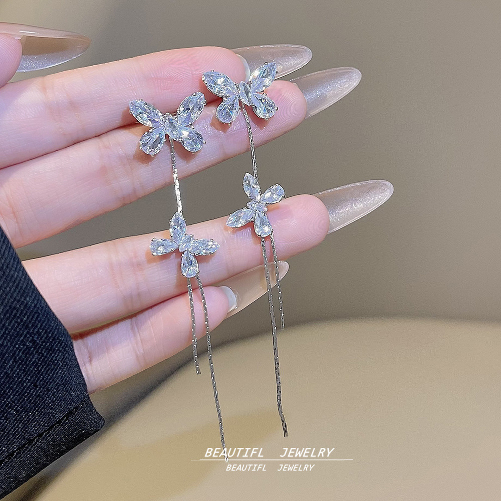 Super Sparkling long Zircon butterfly tassel earrings with a light luxury and high-end feel, niche stud earrings, women's fashionable and elegant earrings wholesale full figure