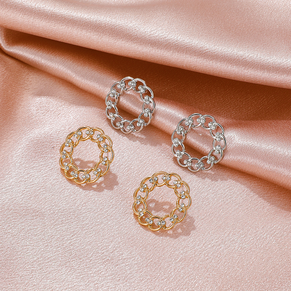 European and American InS-style twisted round stud earrings, women's unique and elegant hollowed-out diamond-encrusted geometric earrings, cross-border best-selling earrings details Picture