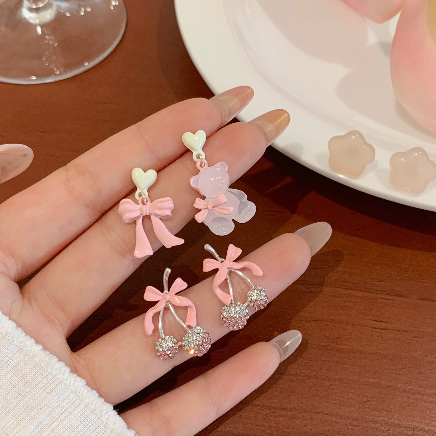 New sweet bow heart-shaped bear earrings for women, silver needle, cute, niche, simple and versatile three-dimensional student earrings details Picture