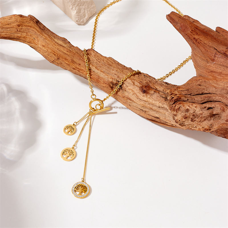 European and American fashionable and individual design, retro gold-plated titanium steel chain tassel life tree pendant accessory necklace details Picture