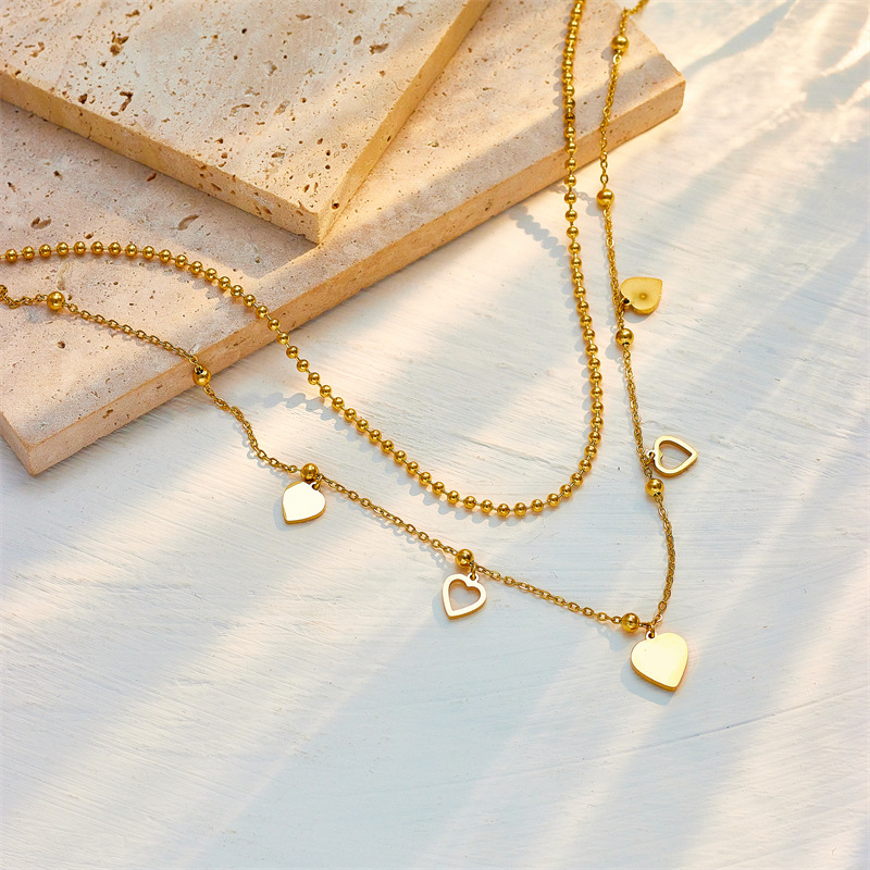 Fashionable heart double-layer titanium steel personalized diamond-encrusted heart-shaped round bead collarbone chain, a niche design accessory necklace details Picture