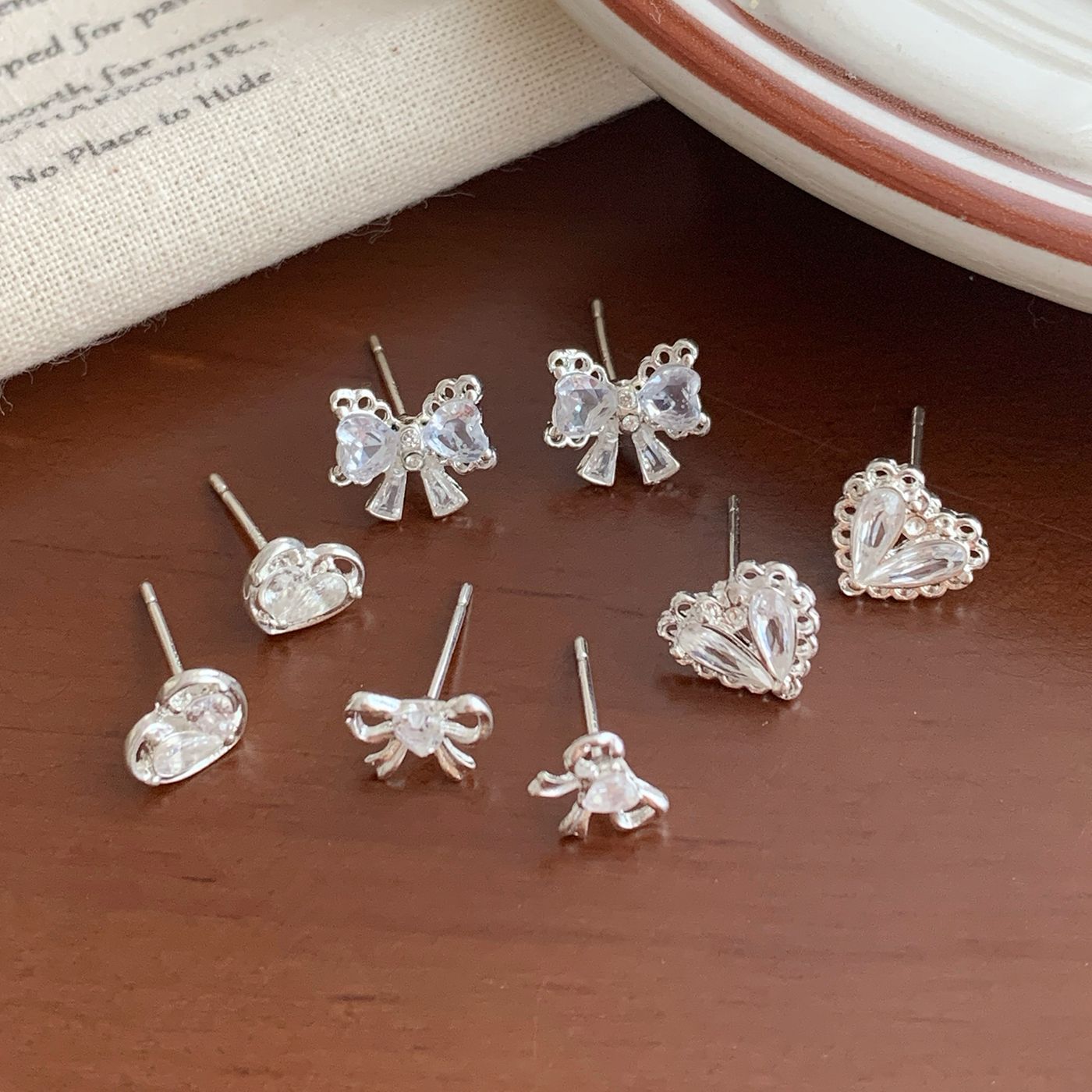 Korean version small and exquisite silver studded with zircon bow stud earrings three-piece set, sweet and heart-shaped female silver needle earrings Application Scenario
