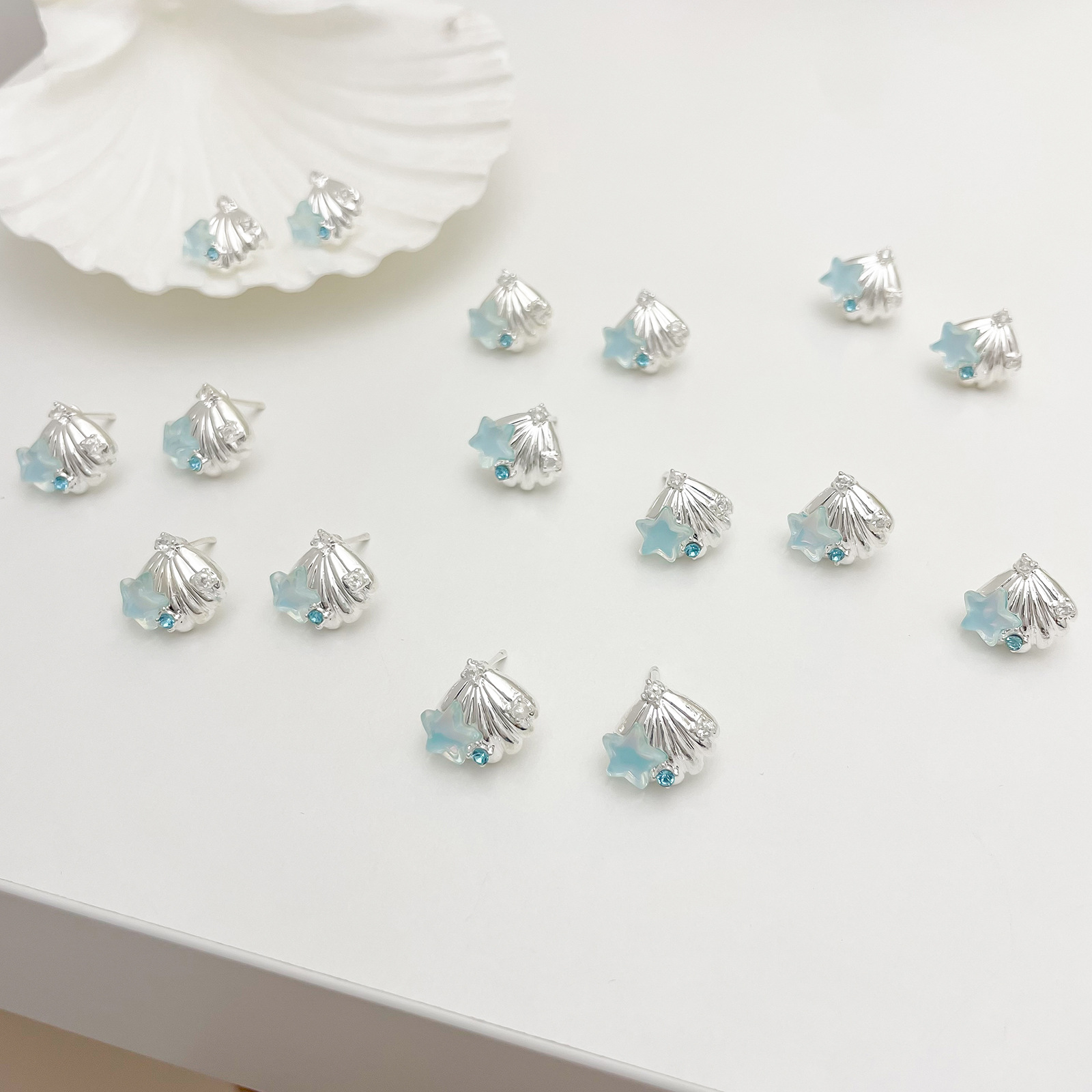 Summer new arrivals: Sea blue shell starfish stud earrings, women's silver needle bestsellers, small vacation earrings, exquisite earrings wholesale full figure