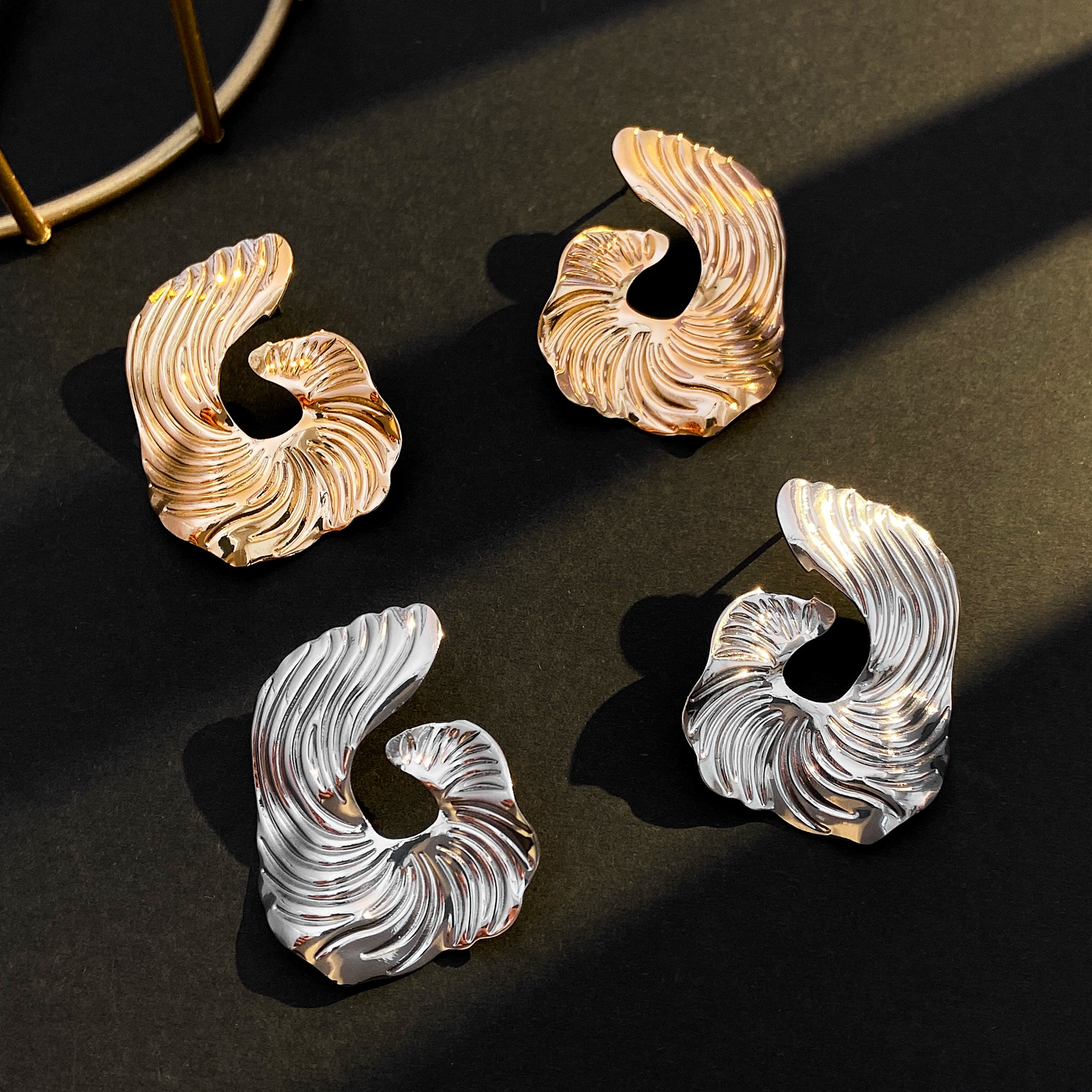 Wholesale of new cross-border irregular stud earrings for women, retro and personalized alloy texture fan-shaped earrings, and exaggerated European and American earrings details Picture