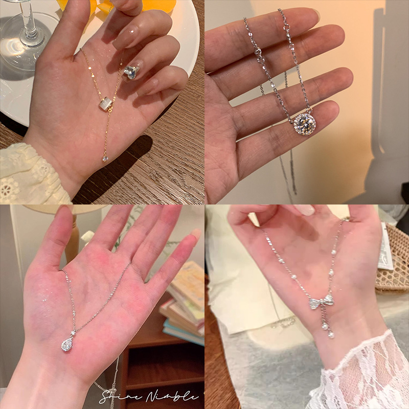 Wholesale of InS-style pearl necklaces with a light luxury, niche and high-end feel for women, sweet and cool collarbone chains, and heart-shaped pendants for hot girls details Picture