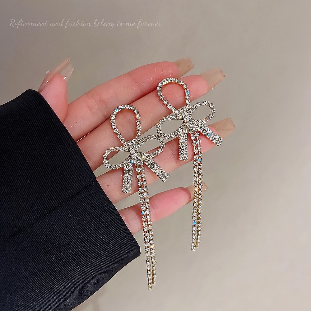Fashionable and elegant bow tassel earrings, light luxury, niche and high-end, new trendy and exquisite earrings for women wholesale full figure