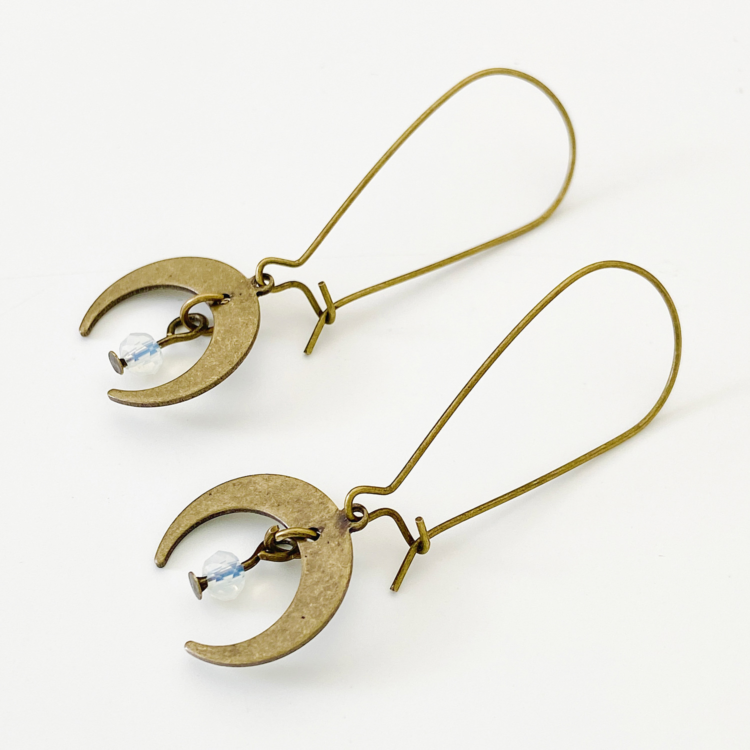 Retro and fashionable small moon earrings, female ethnic style alloy aged crescent moon earrings, European and American style earrings wholesale details Picture