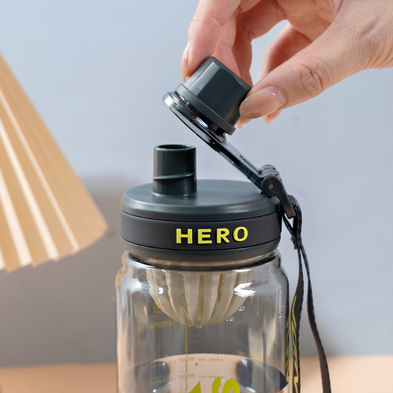 Large-capacity plastic sports water cup for male and female students, summer outdoor fitness, high appearance level, portable water bottle with tea strapping Application Scenario