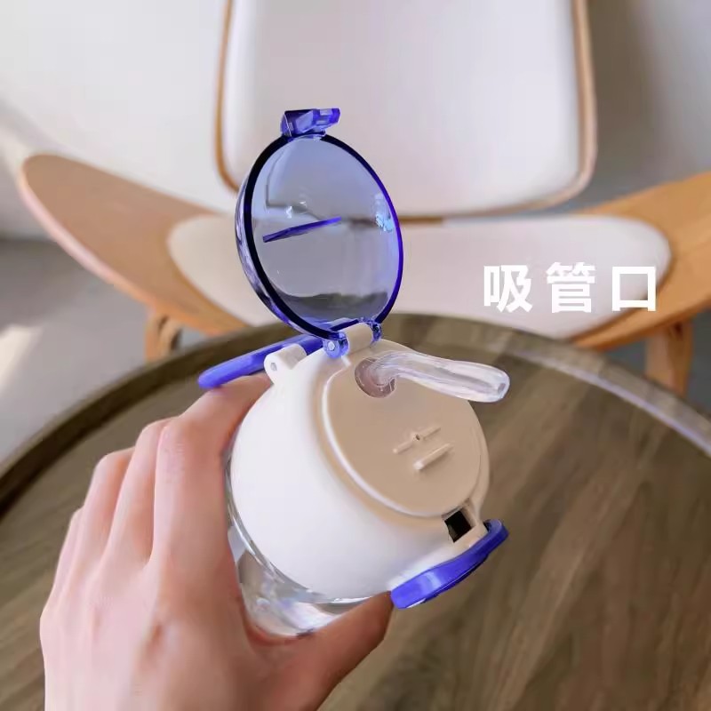 A popular and trendy children's plastic double-drinking cup with a cute and bouncy lid, an outdoor portable straw for direct drinking, and a student sports water cup Application Scenario