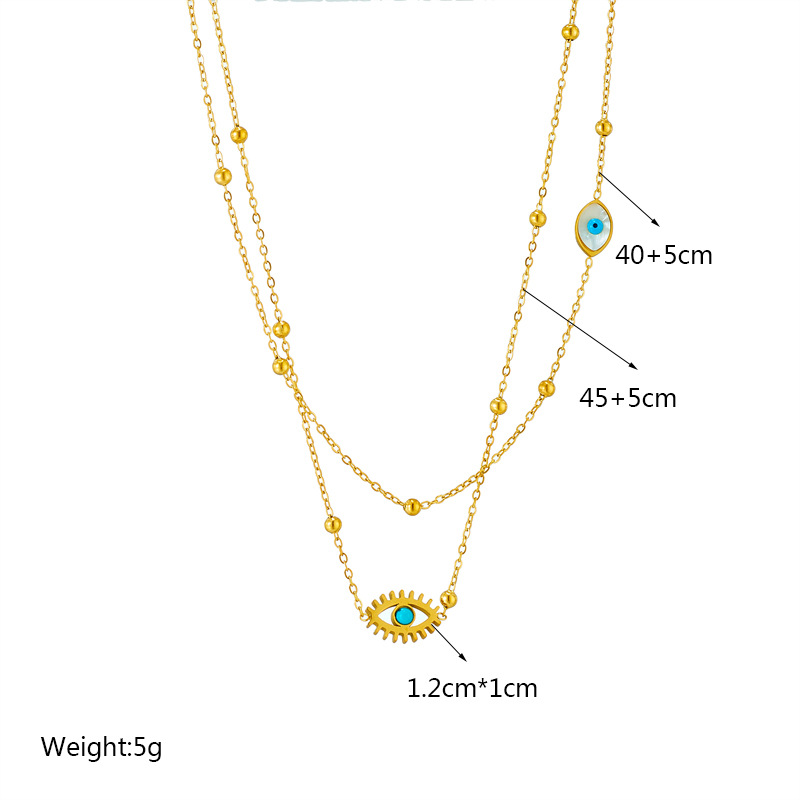 A double-layer mixed chain necklace with gold beads, titanium steel, oil-dripping and hollowed-out blue eyes, featuring a niche and fashionable design from Europe and America Application Scenario