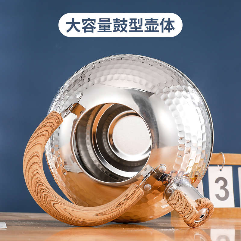 Xiyijia stainless steel whistling kettle, flat-bottomed household whistling kettle, hammer-patterned retro wooden handle, large-capacity whistling kettle details Picture