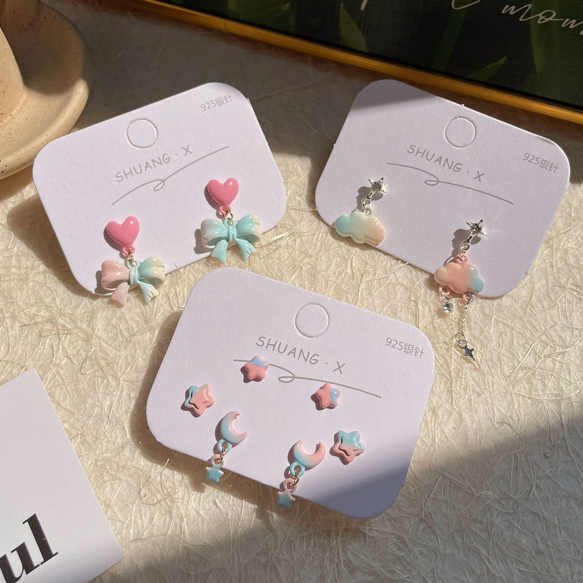 Summer's new rendered bow cloud earrings for women with silver needles, sweet, exquisite, unique and niche five-pointed star earrings Application Scenario
