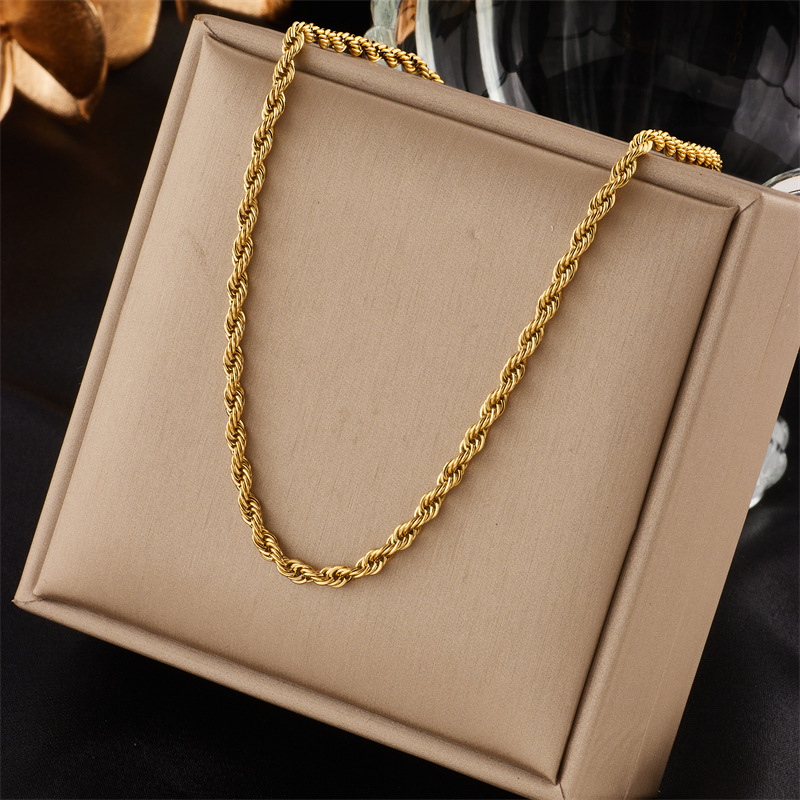 A cross-border fashionable, simple and niche design gold collarbone chain titanium steel twist bare chain jewelry necklace from Europe and America full figure