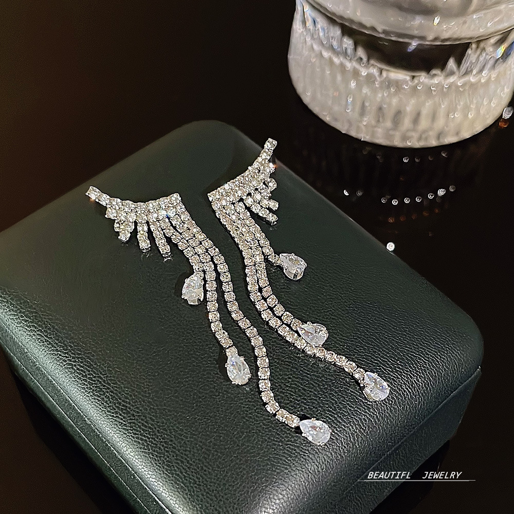 925 Silver Needle long and elegant, slimming face earrings, high-end look, popular zircon earrings, grand earrings, autumn and winter accessories full figure