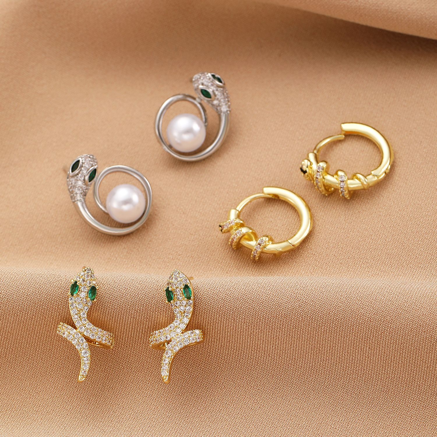 For women born in the Year of the Snake in 2025, this autumn and winter is a unique design with copper inlaid zircon snake-shaped earrings, which are versatile earrings Application Scenario