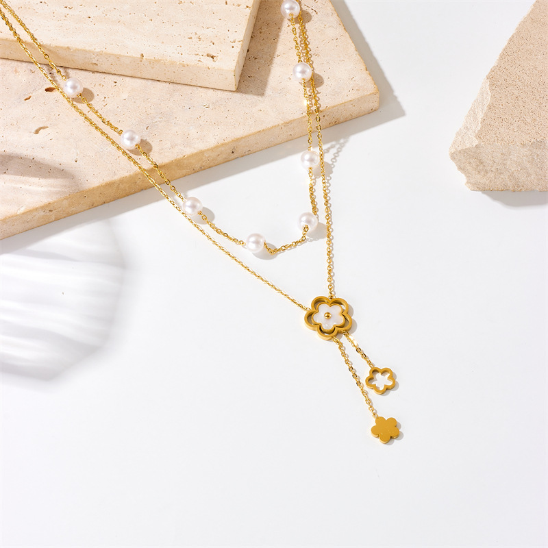 A fashionable and simple double-layer pearl flower chain tassel pendant titanium steel necklace details Picture