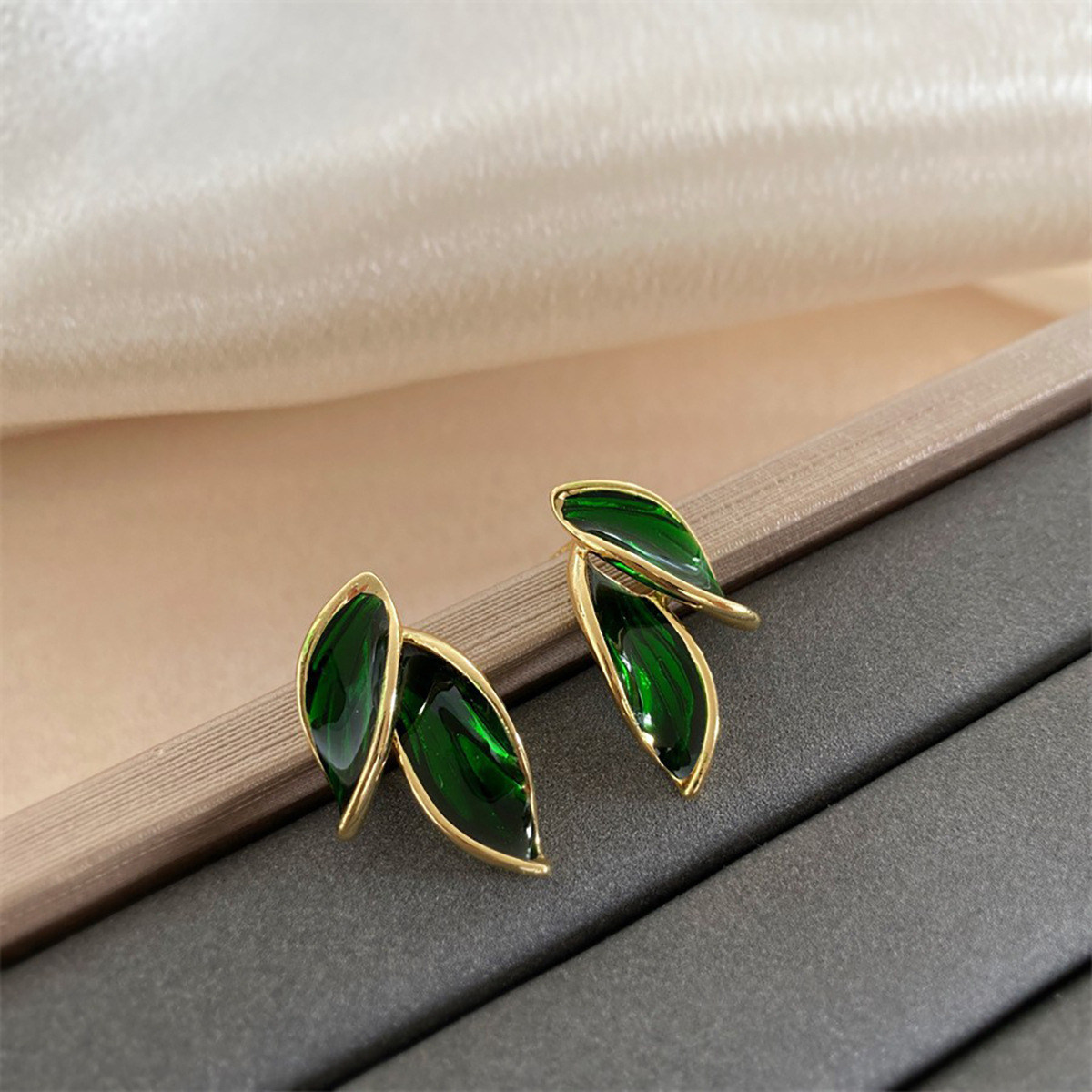 The 2025 new elegant leaf ear studs for ladies feature a fashionable Japanese and Korean style. Made of 925 sterling silver, they are perfect for outdoor wear details Picture