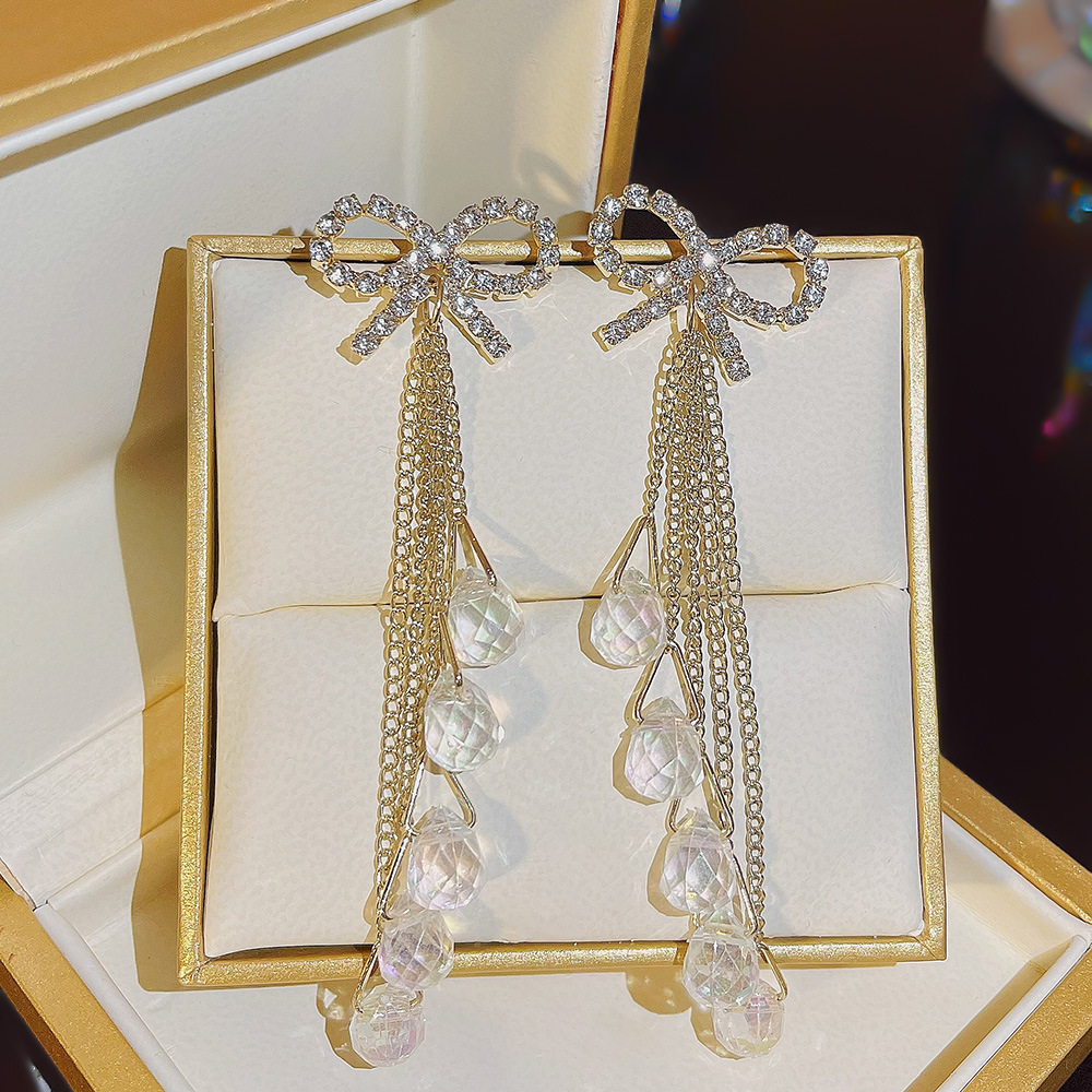 Fashionable and elegant, cold style, exquisite and individual, bow crystal earrings, tassels, high-end and exaggerated earrings for women wholesale full figure