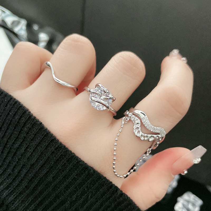 A niche design chain tassel zircon open ring for women, a light luxury, exquisite and fashionable ink-style ring trend full figure